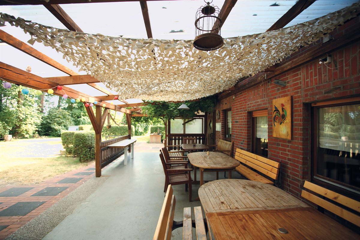 Überdachte Terrasse des Gruppenhauses