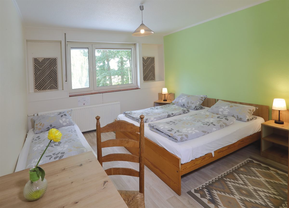 Zimmer mit Doppel- und Einzelbett